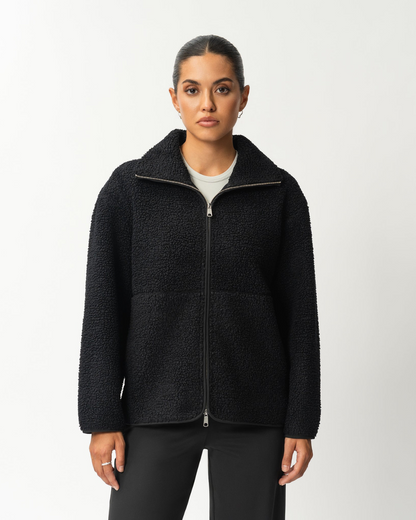 Abrigo de lana con cremallera frontal y cuello alto